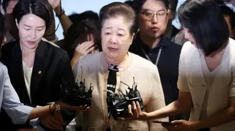 Disputed Religious Head Dismisses Bribery Claims Involving Former South Korean President's Wife